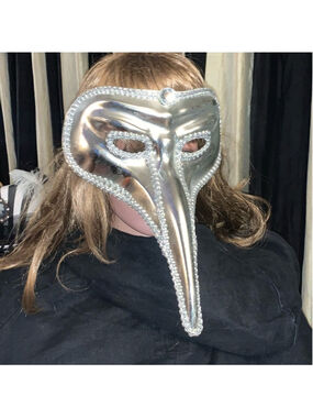 Two Venetian style masks with long noses